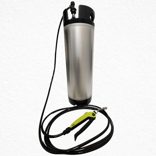 Metal pressure washer with hose and nozzle on a white background