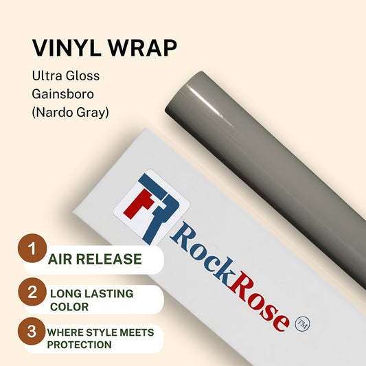 A rolled up piece of RockRose Ultra-Gloss Vinyl Wrap in Nardo Gray color, showcasing the product's brand and features like air release, long lasting color, and protection.