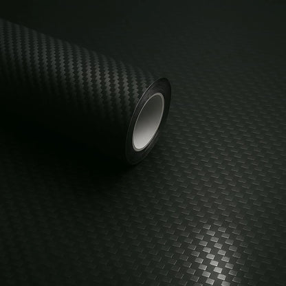 Close-up of a 3D carbon fiber vinyl wrap matte roll showing realistic textured finish.