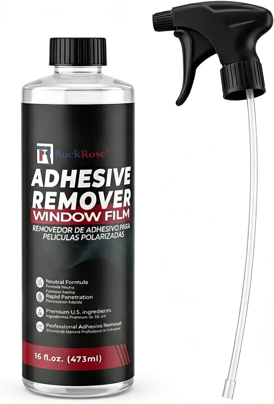 Adhesive remover bottle with a spray nozzle on a white background