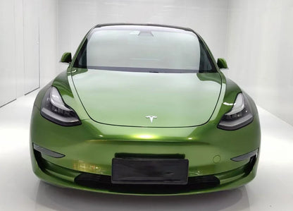 Green Tesla car on a white background