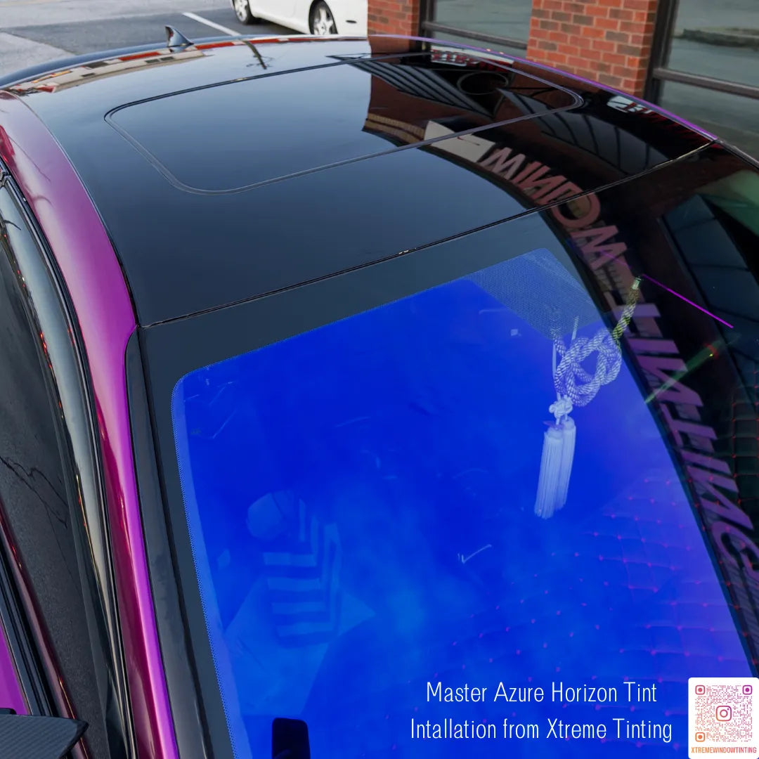 Car window with blue tint and Horizon Tint Installation from Xtreme Tinting'text.