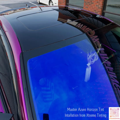 Car window with blue tint and Horizon Tint Installation from Xtreme Tinting'text.