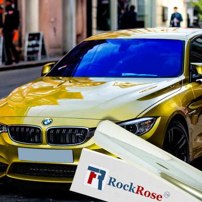 Gold bmw with blue chameleon tint and rockrose branding and logo