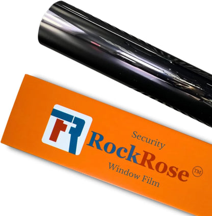 A roll of black RockRose security window film shown diagonally above its bright orange packaging box on a white background.