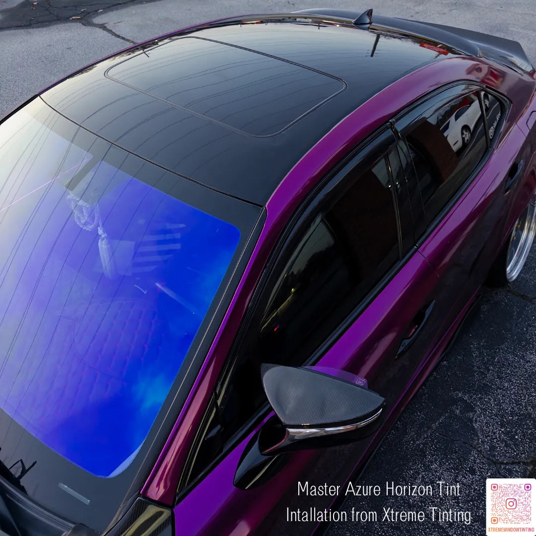 Close-up of a car with  Azure Horizon Tint deep blue on a violet car