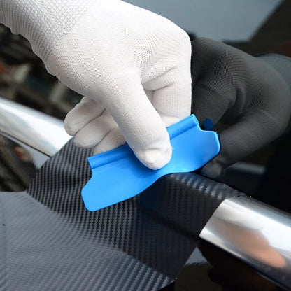 Blue squeegee on a carbon fiber window