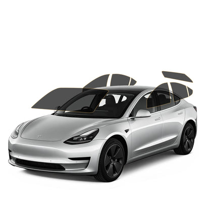 Silver Tesla car with precut tint on all windows
