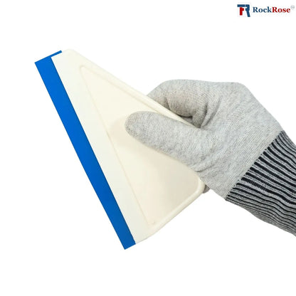 Hand wearing a gray glove holding a silicone tint squeegee with blue edge on a white background, featuring the RockRose logo.