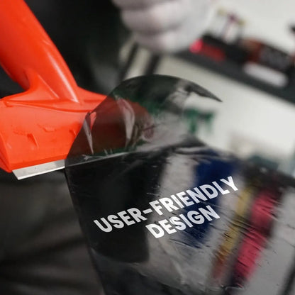 Close-up of a tool with a 'USER-FRIENDLY DESIGN' text overlay in a workshop setting.