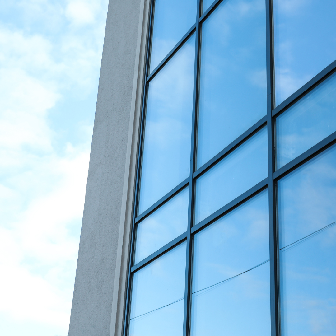 Reflective silver outside window tint for heat and glare reduction