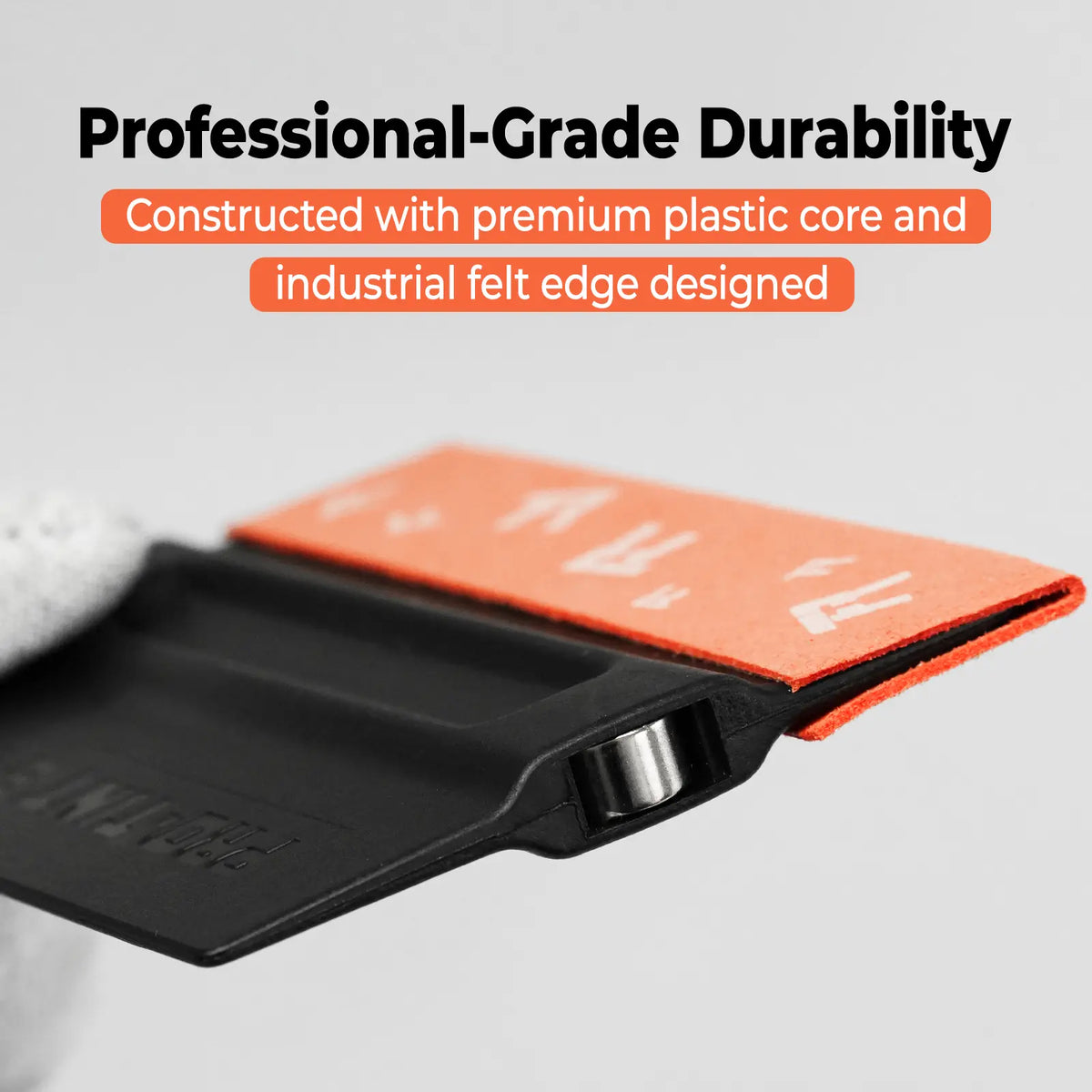 Close-up of a RockRose Black Wing Squeegee – 3.9 industrial tool or handle with an orange felt edge, shown against a light gray background with promotional text about durability.