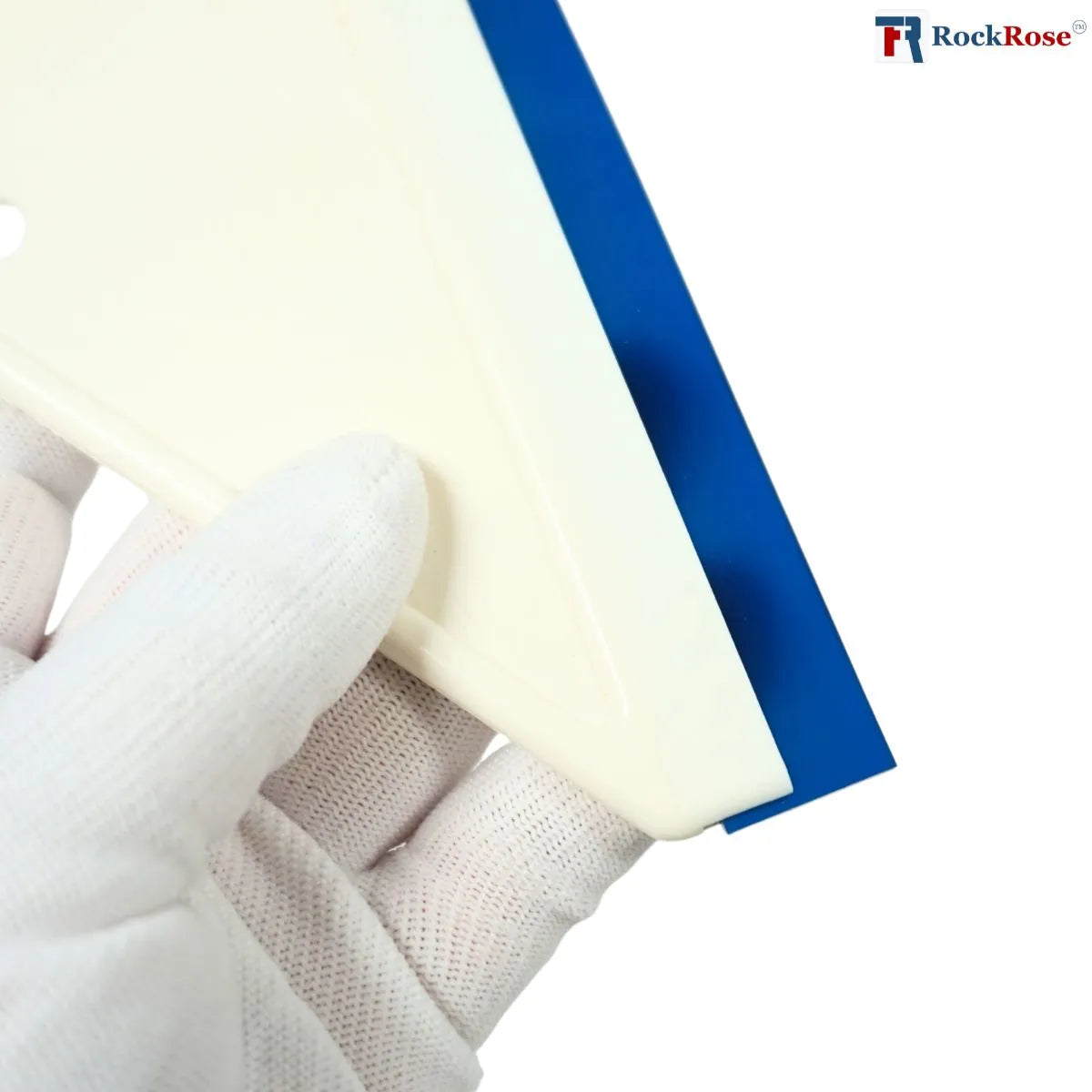 Close-up of Side Swipe Silicone Tint Squeegee   including white, beige, and blue on a white background with RockRose logo.