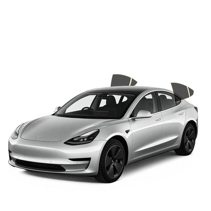 Silver Tesla car on a white background with precut tint on back doors