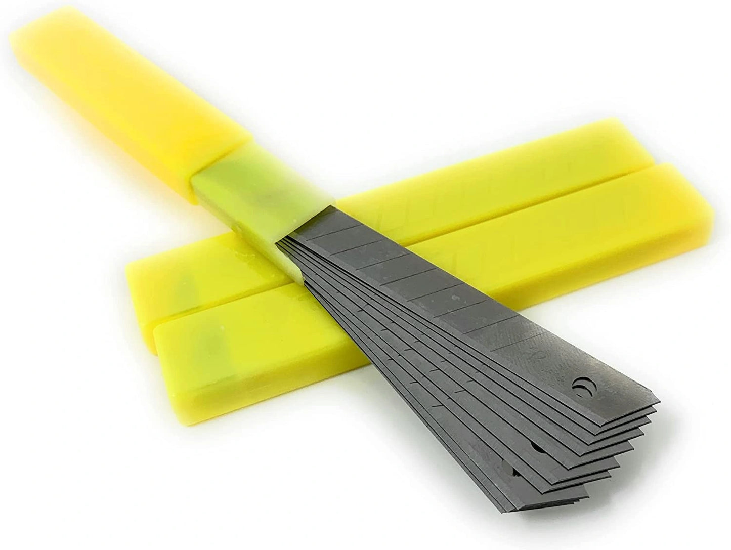 Set of yellow plastic tools with metal blades on a white background