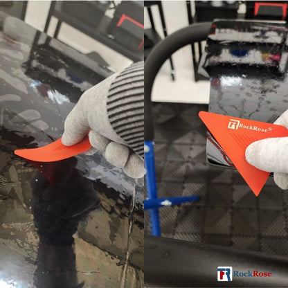 Person using a car detailing Tri-Edge Red Corner Card  tool on a car's surface with RockRose branding.