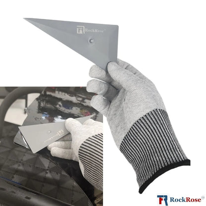 Person using a putty knife on car bodywork with RockRose logo