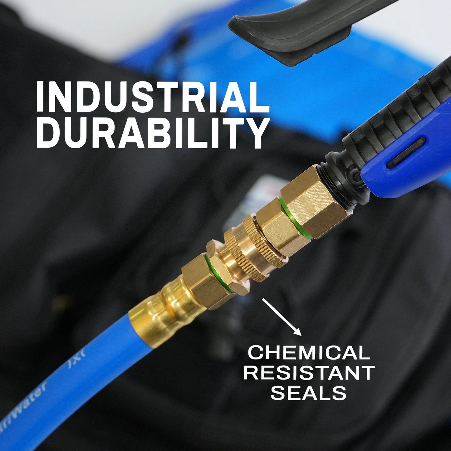 Blue hose with brass fitting labeled 'Chemical Resistant Seals' on a blurred background