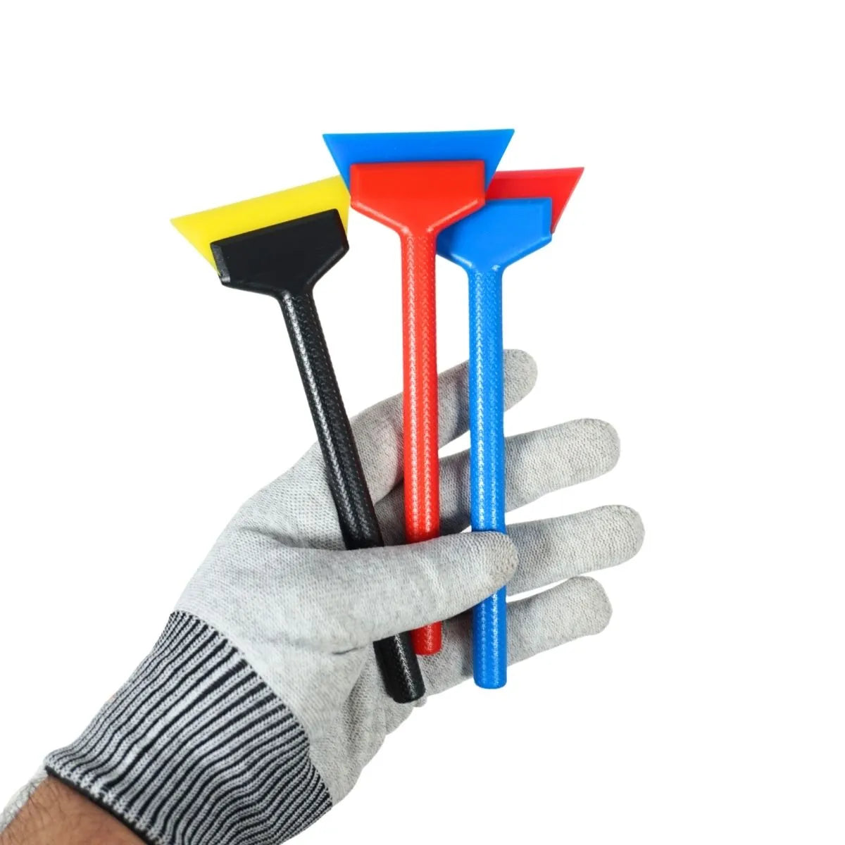 Holding a 3 pieces mini squeegee multiple colors using a left hand with glove