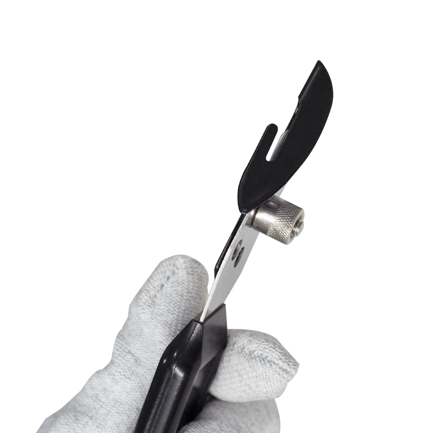 Hand holding a Single blade vinyl cutter  with black handles on a white background