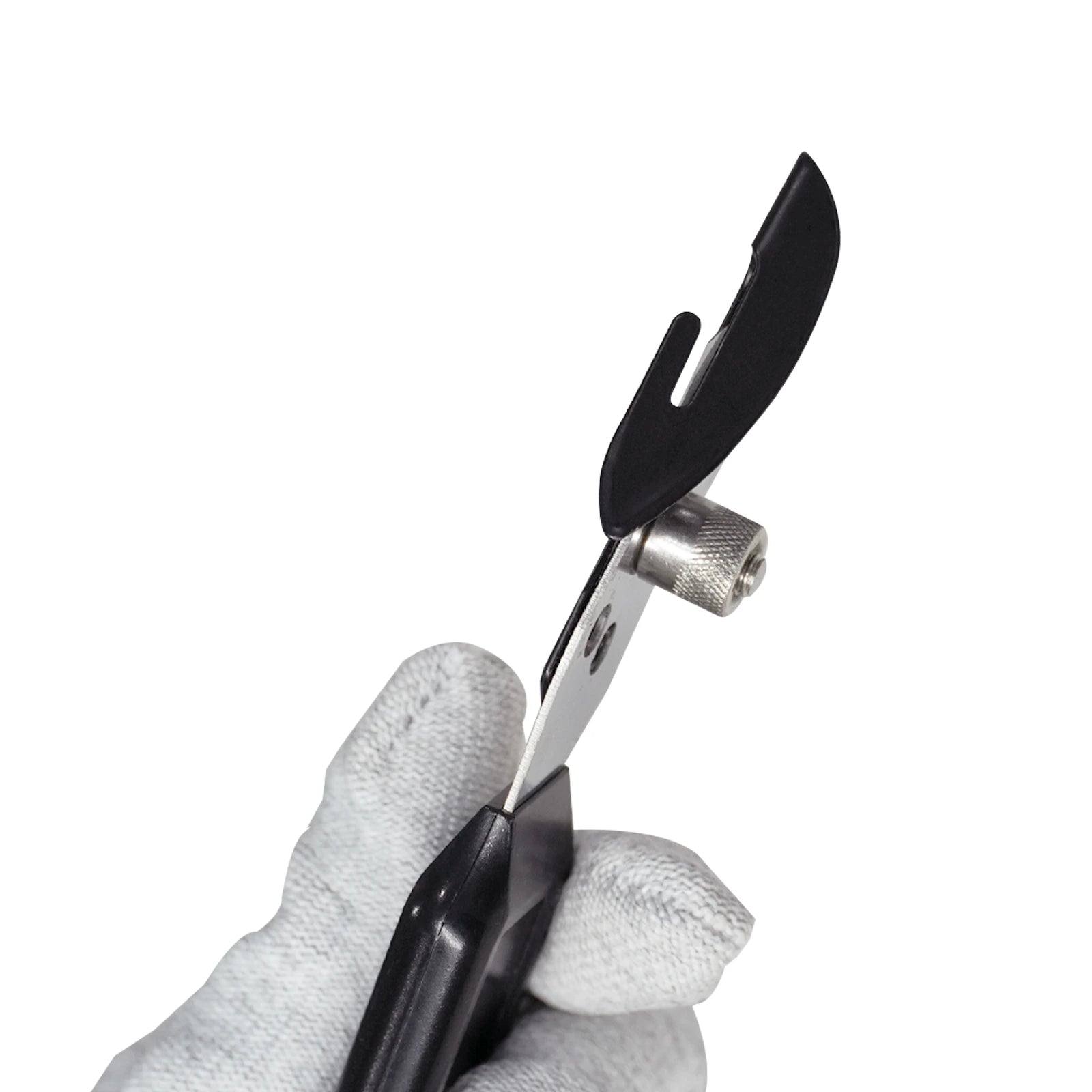 Hand holding a Single blade vinyl cutter  with black handles on a white background