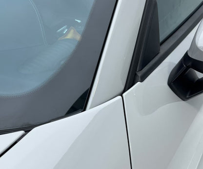 white car with glass and side mirror