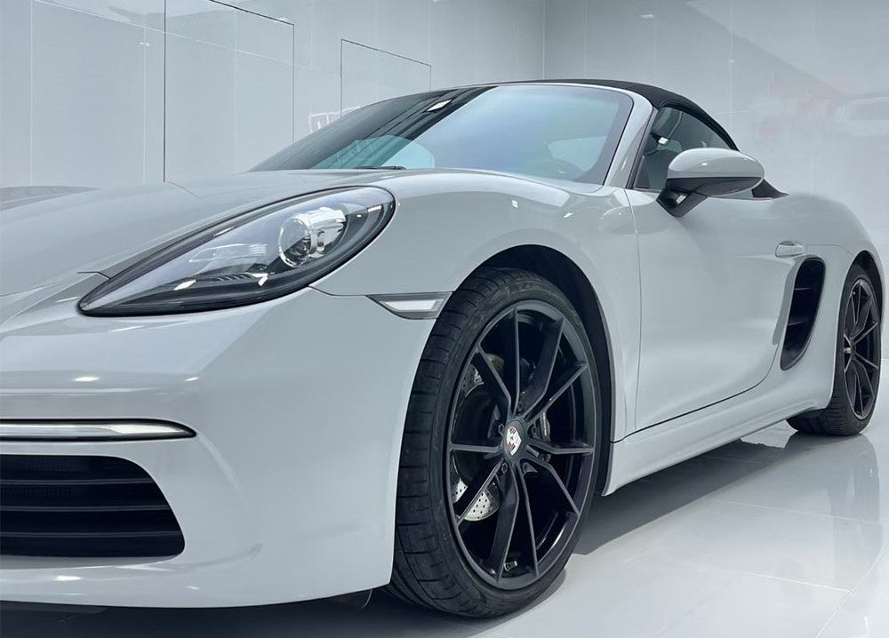 white porsche ultra gloss paint with headlight and black mags